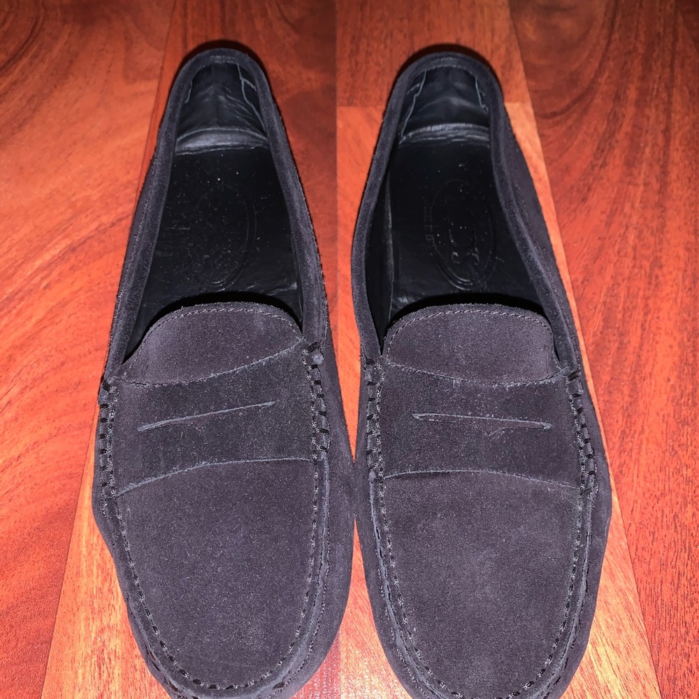 Tod’s black suede loafers